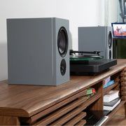 PSB iQ2 BluOS Streaming Powered Speaker in Granite Grey (Pair) Lifestyle - Audiolab